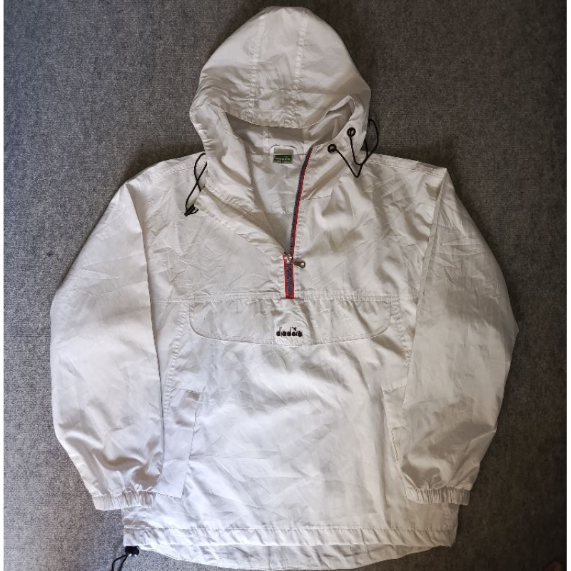 Jaket Winbreaker Cagoule Kantong Doraemon By Diadora Warna Putih Original 100%