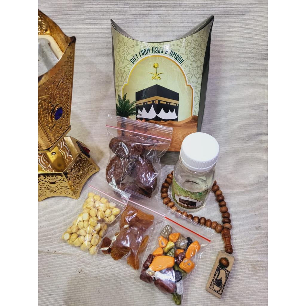 

Paket 8 oleh oleh haji dan umroh air zamzam ori + Coklat krikil + Tasbih kayu