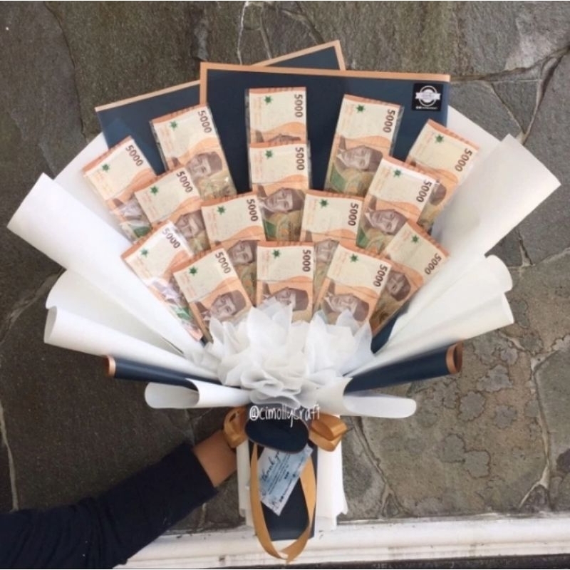 

Bucket Uang 5000an murah meriah 10 Lembar