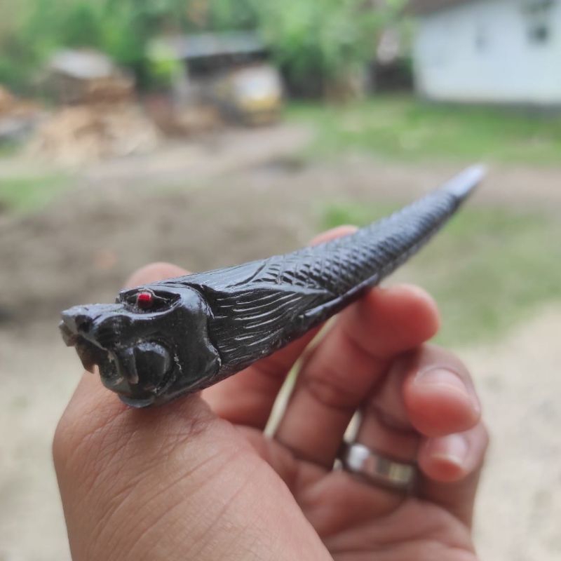 once tanduk kerbau hitam ukir naga