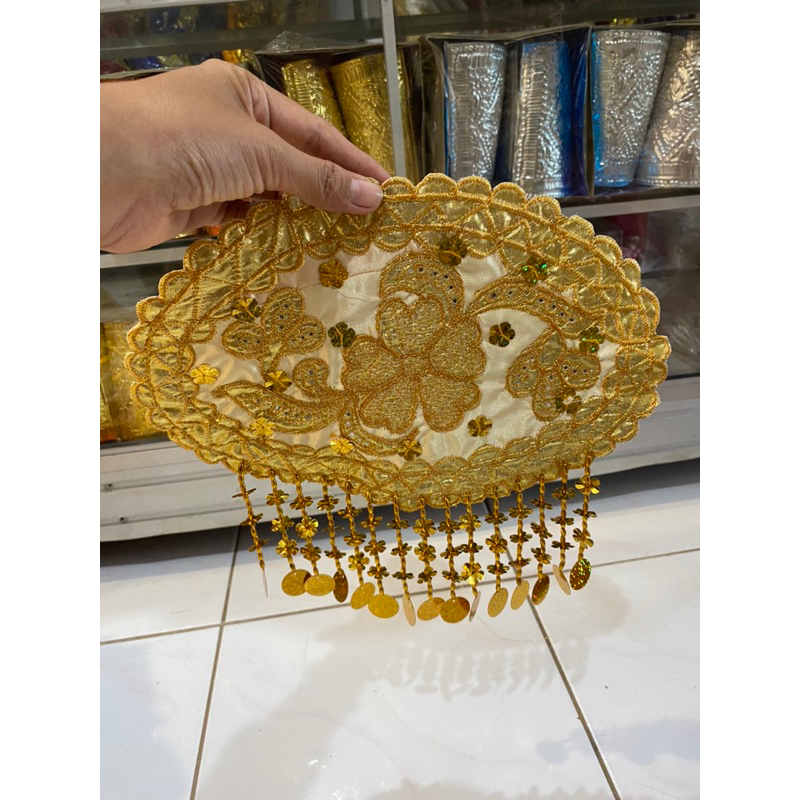 Sibak kulambu/ ikat lansia dekorasi pelaminan minang