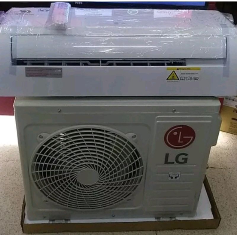 AC setengah pk LG