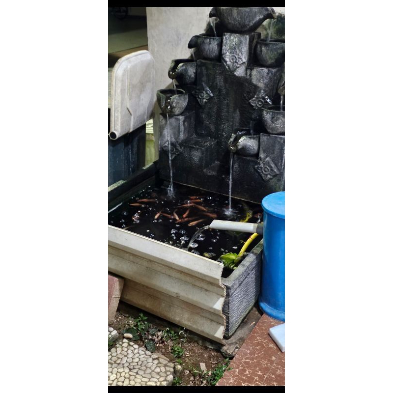 kolam ikan batu alam beton
