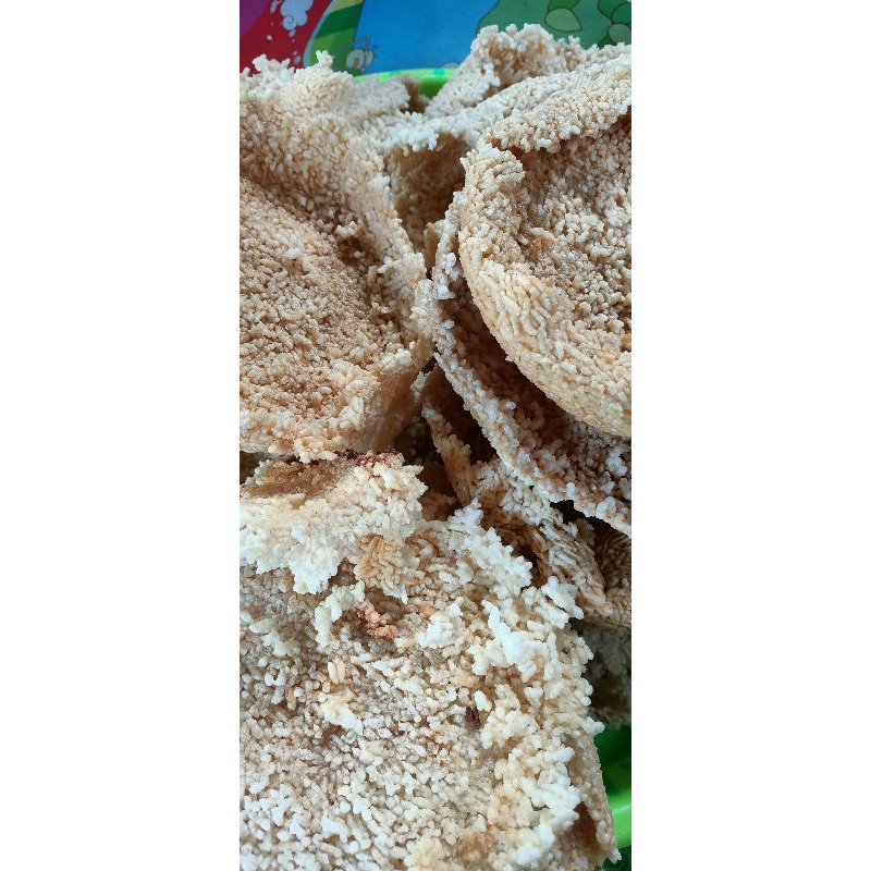 

Intip kerak nasi/ intip goreng Gurih dan asin 200 gram. 2 pcs 15000