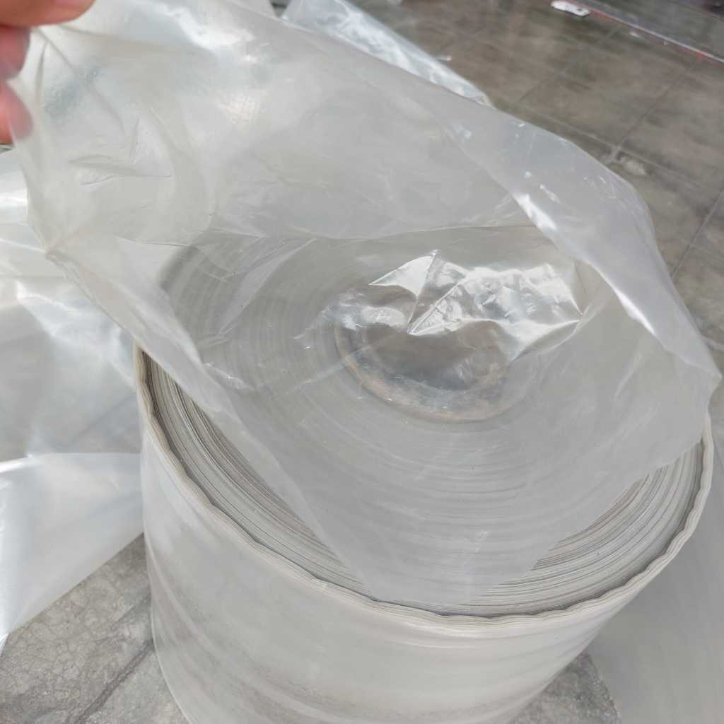 Plastik PE tebal cover pembungkus karpet ambal rol kain lebar 28,5cm