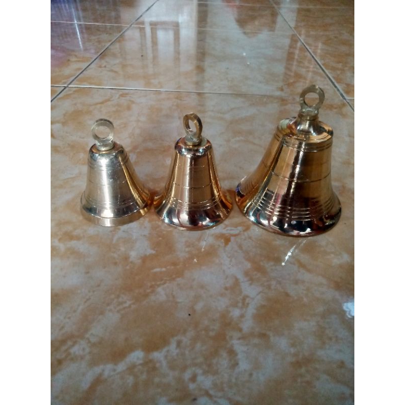 lonceng sapi, lonceng kuningan