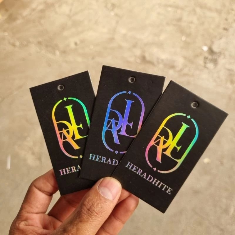 

Hangtag premium foil hologram tag label hangtag baju hangtag pakaian