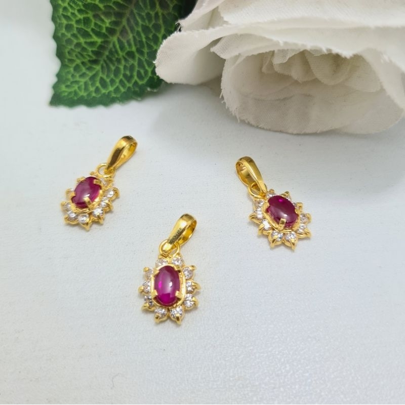 Liontin Mata Merah Siam Emas Muda