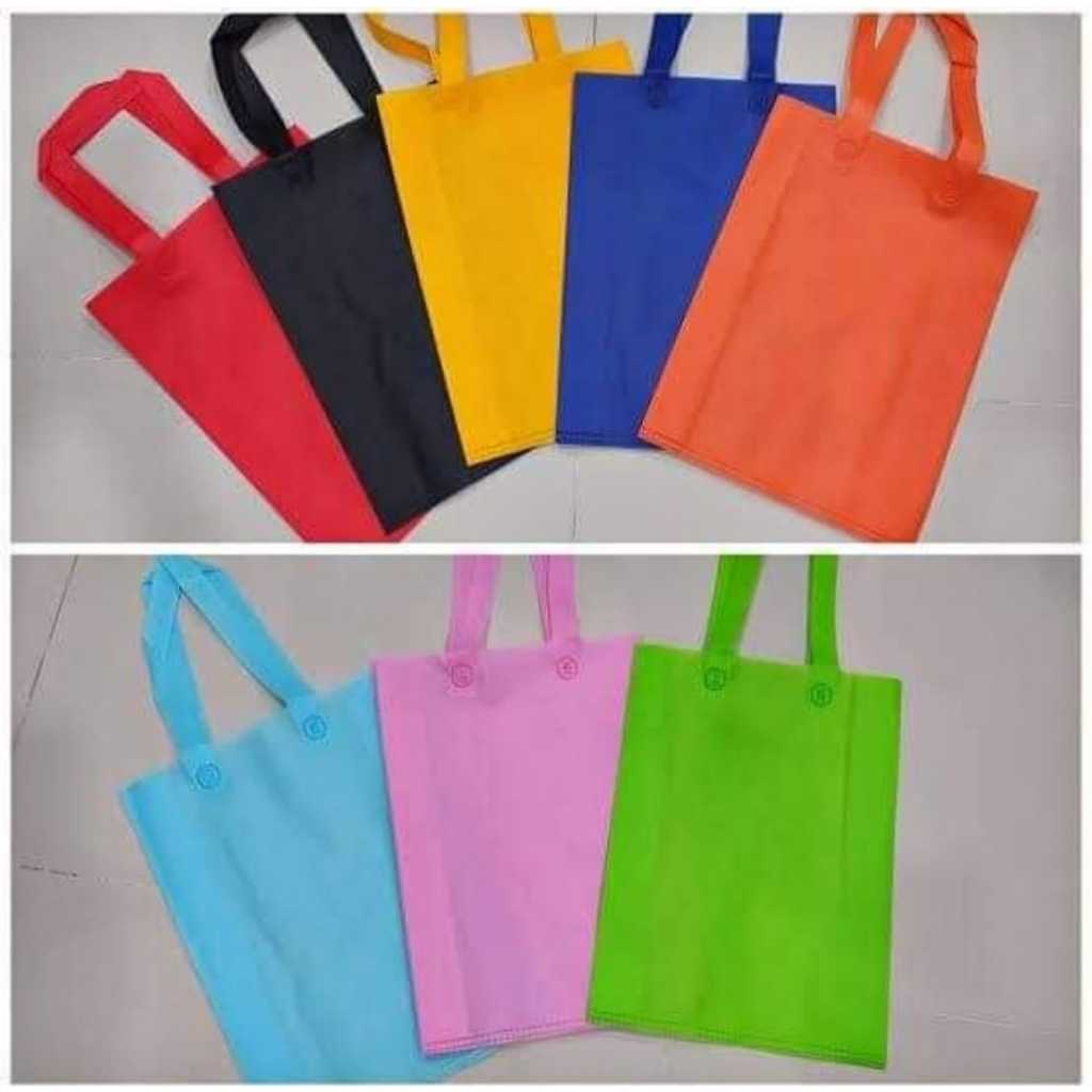 

Tas Spunbond tali press handle lipat samping 38 x 45 x 8 tote vag hajatan,ulangtahun,natal