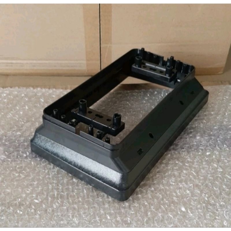 Frame head unit android 9 inch mobil calya sigra