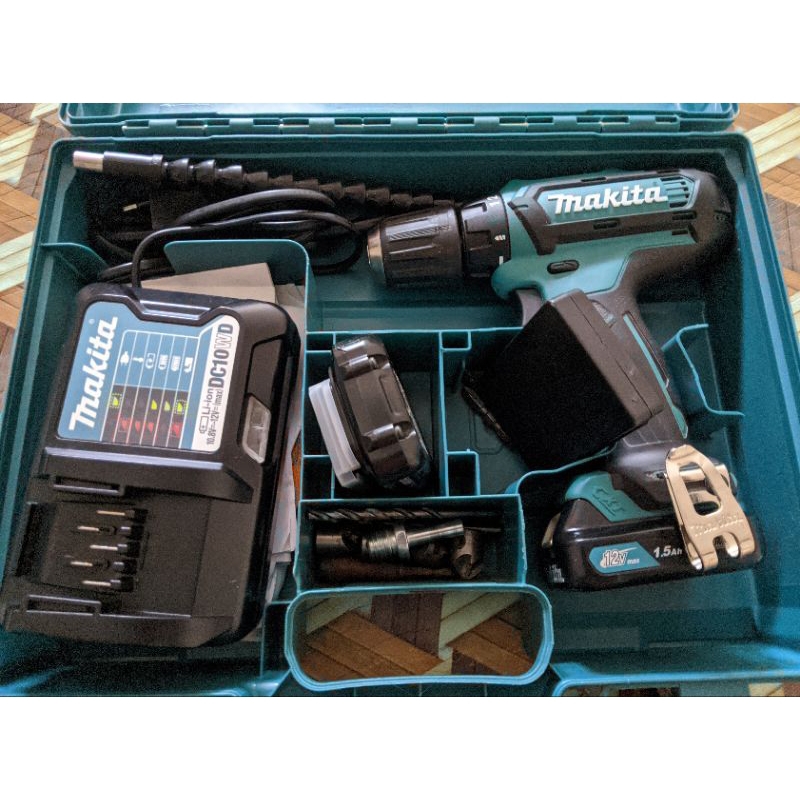 Cordless drilBor batrei Makita DF331D