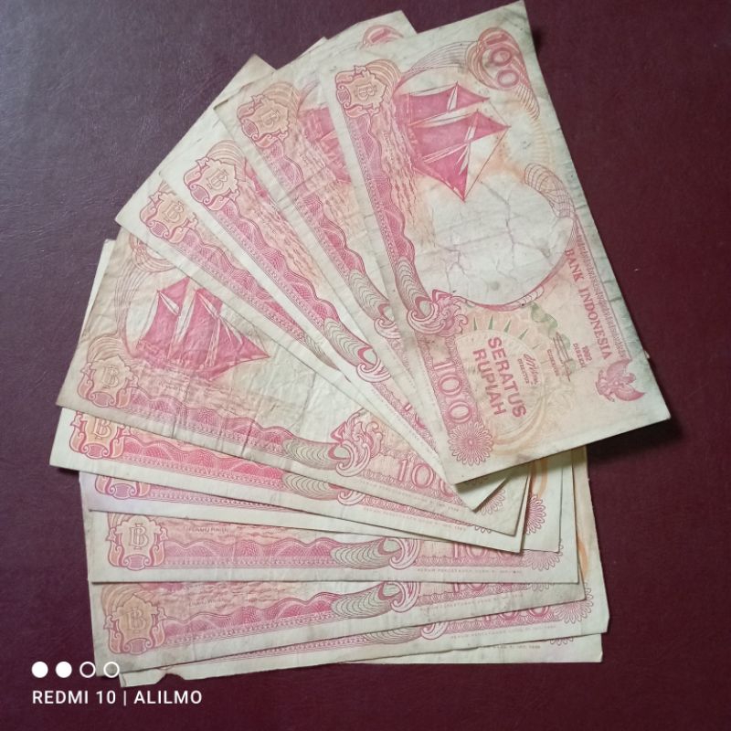 100 rupiah pinisi uang kertas beredar jelek apadanya asli