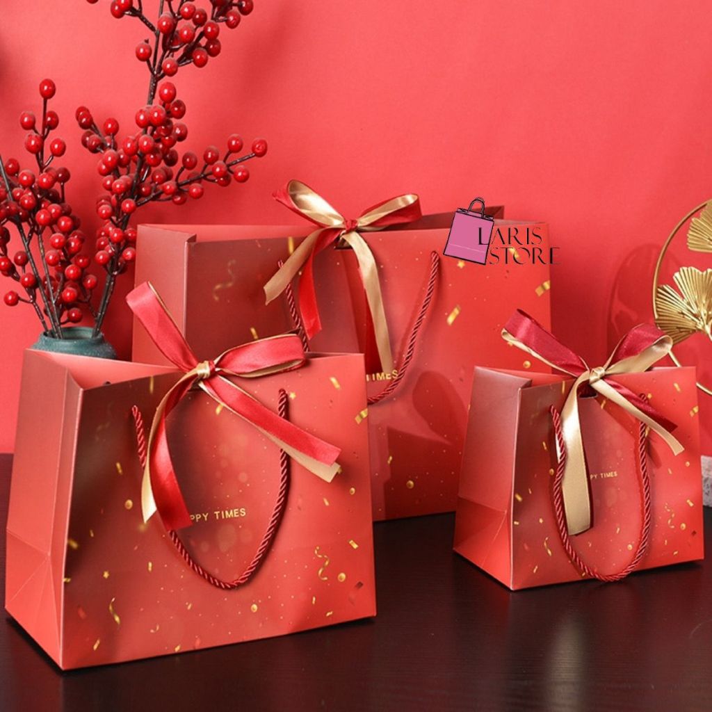 

Paper Bag Premium Merah Salju + Pita Tas Goddie Bag Tebal Gift Box