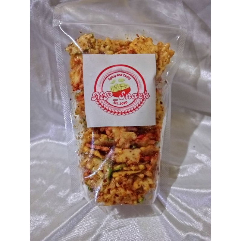 

CEMILAN KURUPUK BUNGA PEDAS CIKRUH DI TABURI CIKUR 300gr