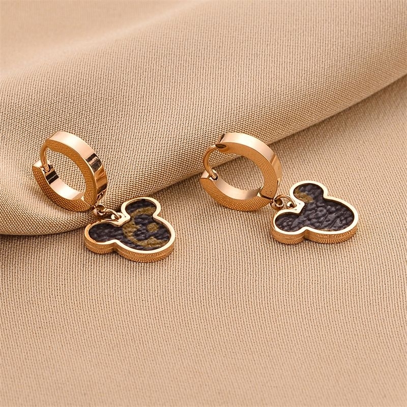 anting mickey titanium asli