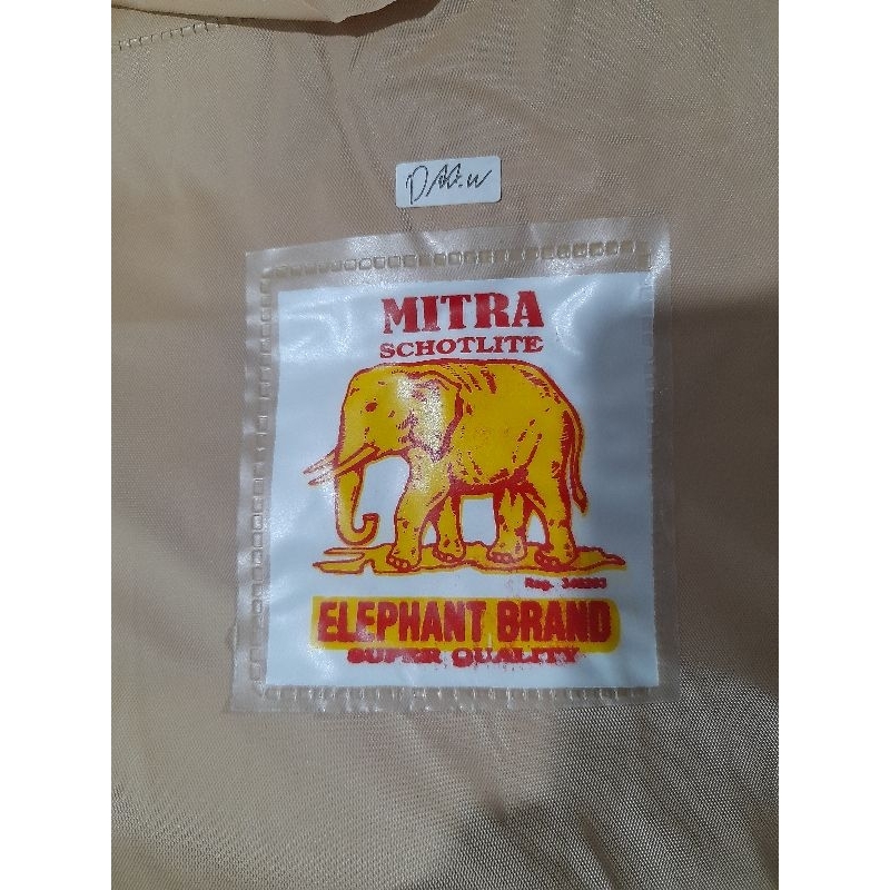 jas hujan mitra coklat muda belah samping