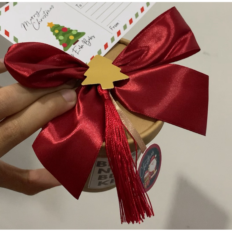 

tambahan pita utk brownies bucket/pc