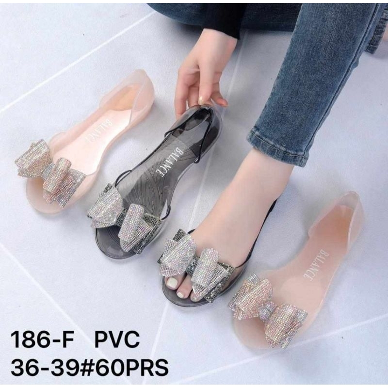 BALANCE 186-F / SANDAL JELLY WANITA MOTIF PITA / SANDAL JELLY TRANSPARAN
