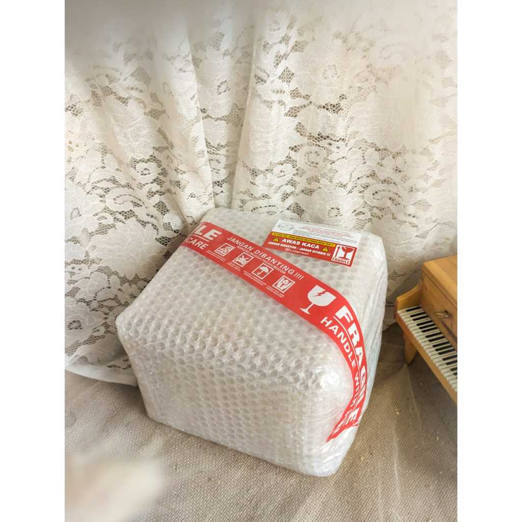 

Tambahan Bubble Wrap & Garansi Kerusakan (Hanya untuk Tempat Perhiasan Mini)