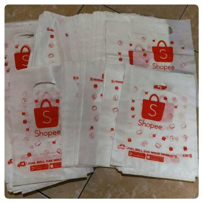 

Plastik kemasan tas jinjing bungkus 30 x 40 sablon orange warna tebal