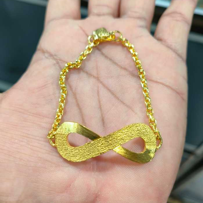 Gelang infinity lapis emas
