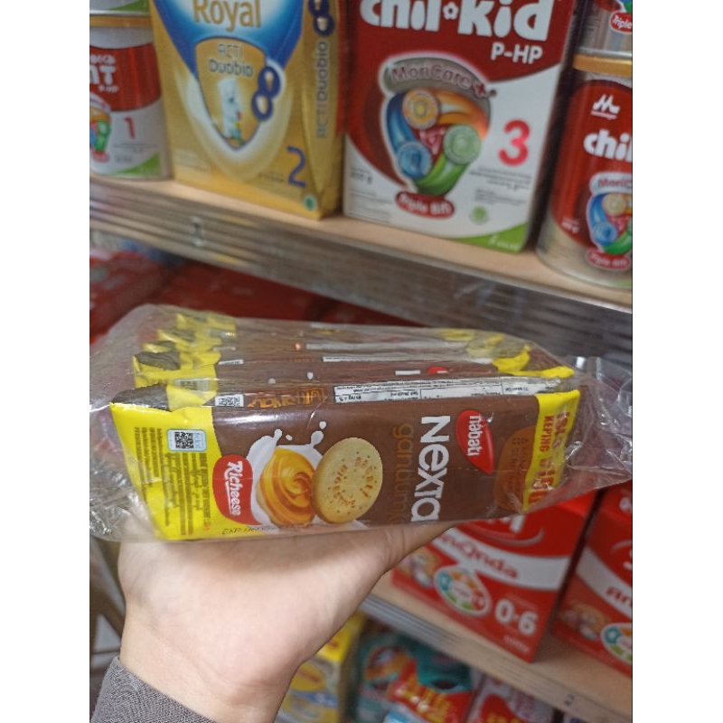 

NEXTAR GandumKuBiskuit Sandwich krim Cokelat dengan gandum dan susu