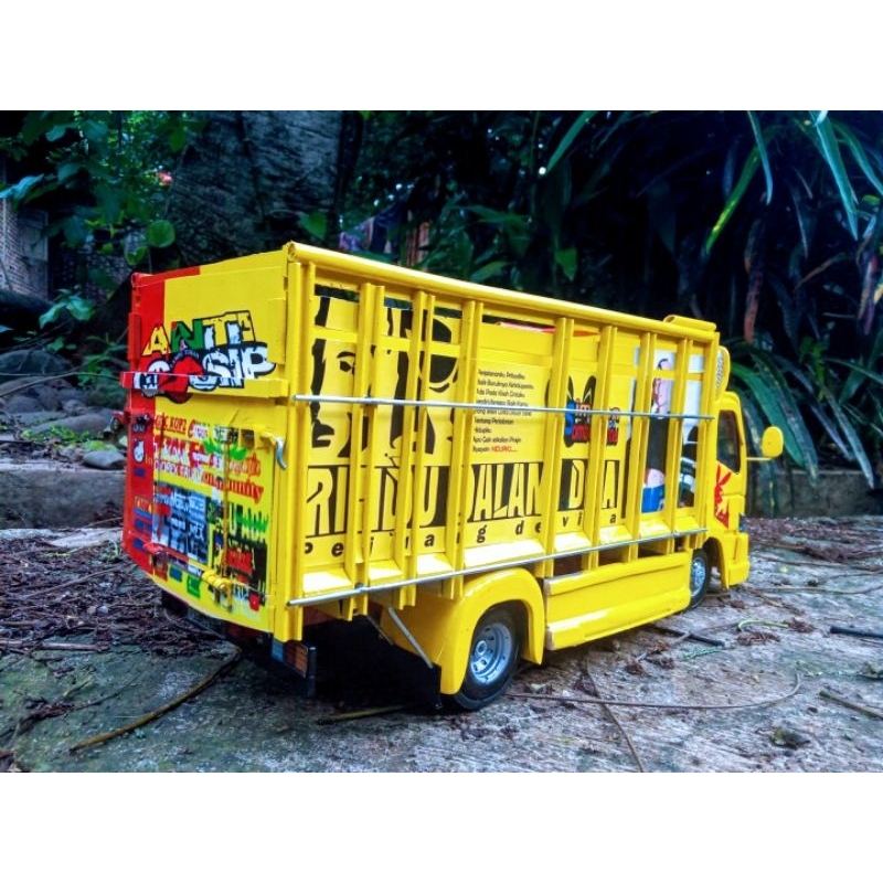 truk oleng Anti gosip miniatur kuning Oren