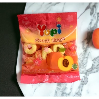 

PERMEN YUPI GUMMY PEACH RINGS MINI 45 GRAM