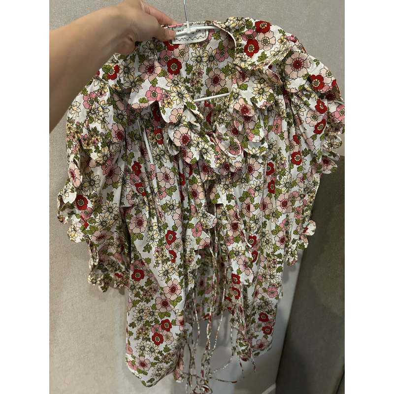 the story of scallop flower top