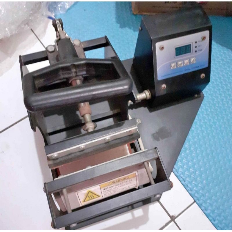 

MESIN PRESS MUG
