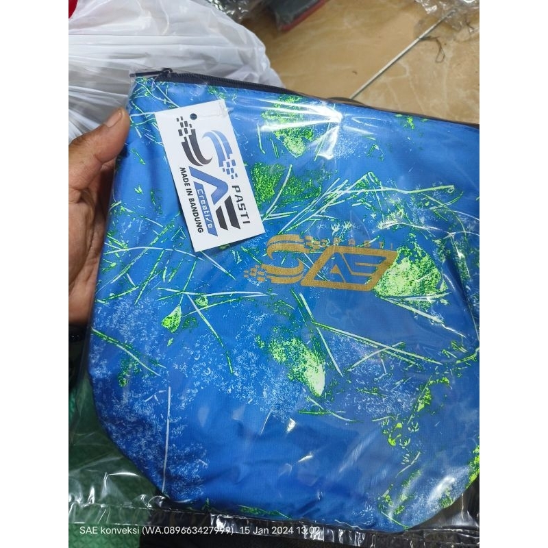 jas hujan kantong kanguru