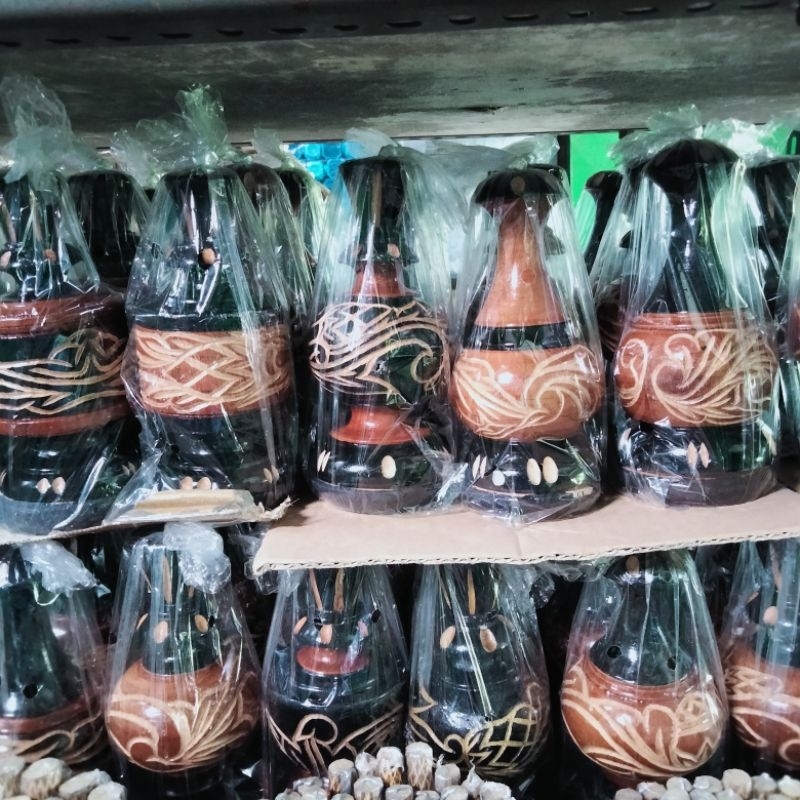 Pion sangkar burung motif random bahan kayu jati