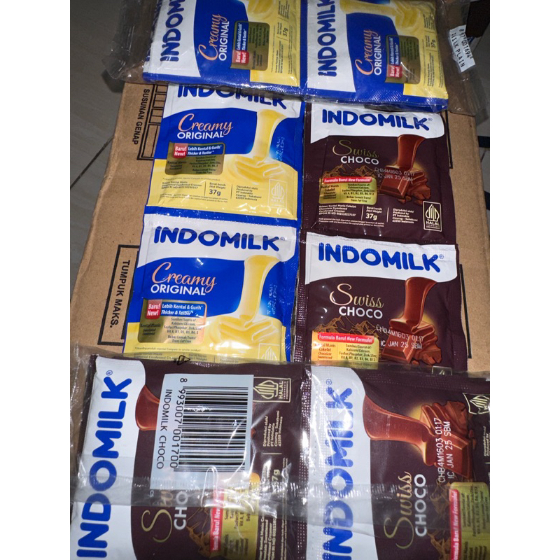 

Indomilk Susu Sachet Putih dan Coklat Rasa Creamy Original Dan Swiss Choco