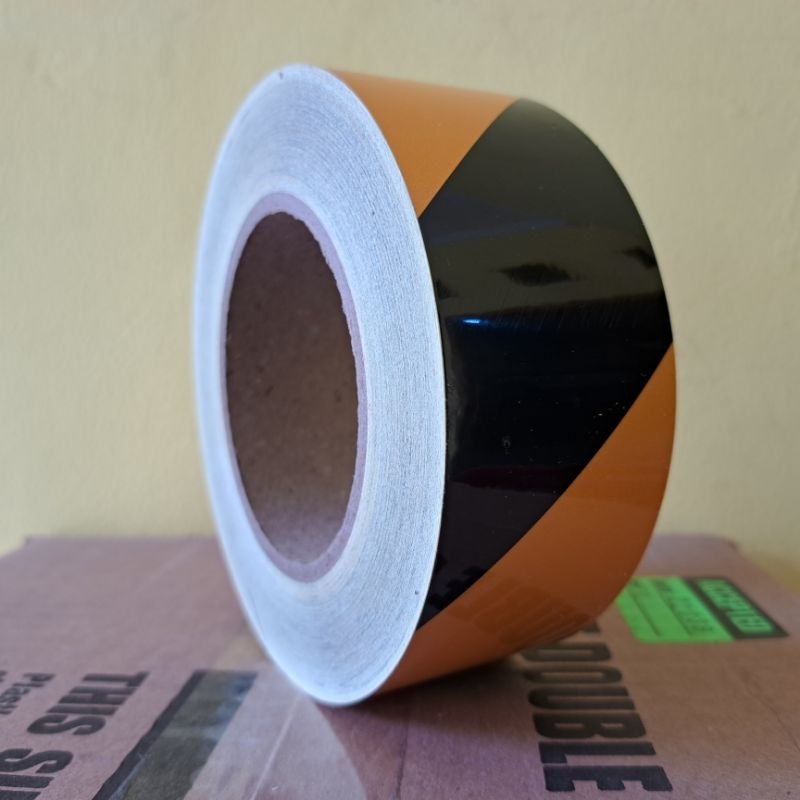 

Stiker reflektif / reflective hitam kuning 5cm x 45m