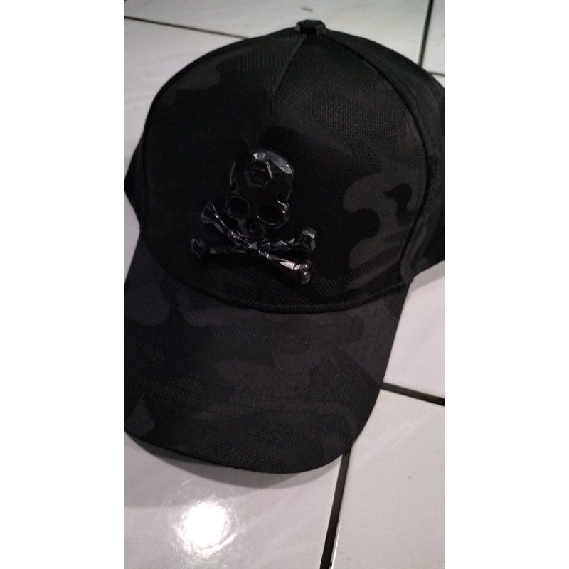 topi ny hitam