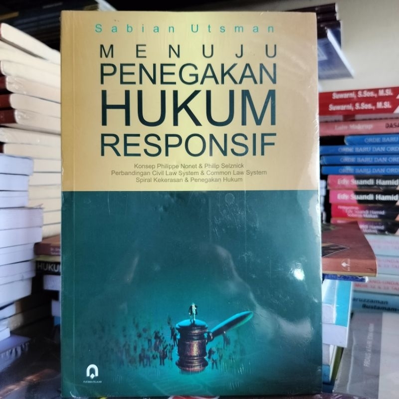 Buku Menuju Penegakan Hukum Responsif ( MENUJU PENEGAKAN HUKUM RESPONSIF )