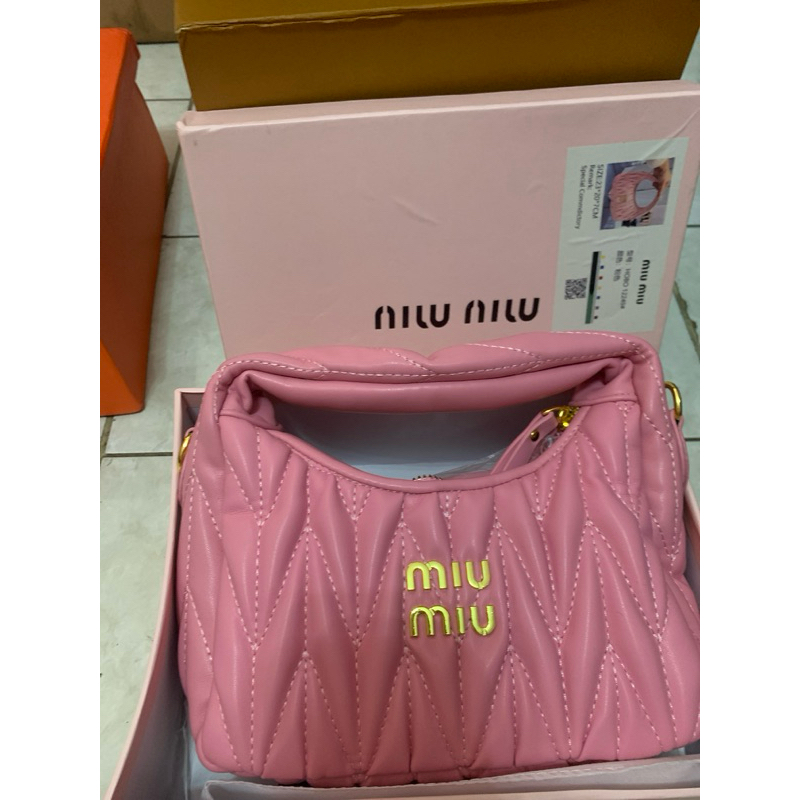 tas import miw miw warna pink dan putih