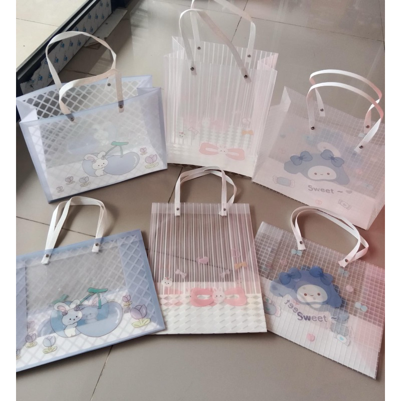 

paperbag bening motif 25 x 32 impor berkualitas