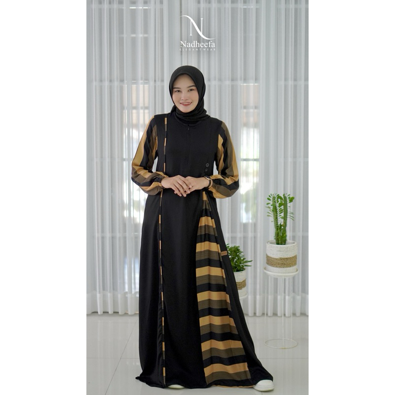 Dress by Nadheefa Store