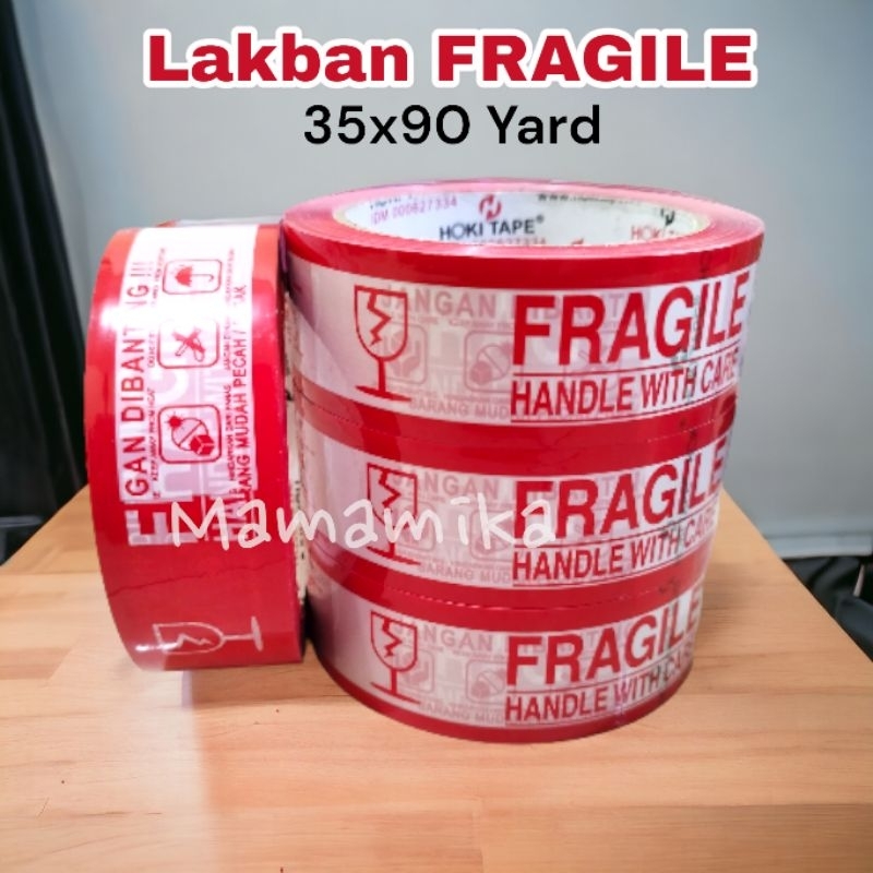 

LAKBAN FRAGILE 35x90 Yard / LAKBAN PECAH BELAH