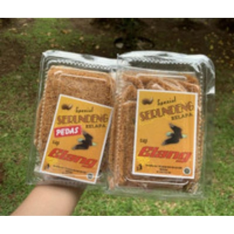 

Serundeng / Srundeng Kelapa Cap Elang Kemasan Mika 250gr