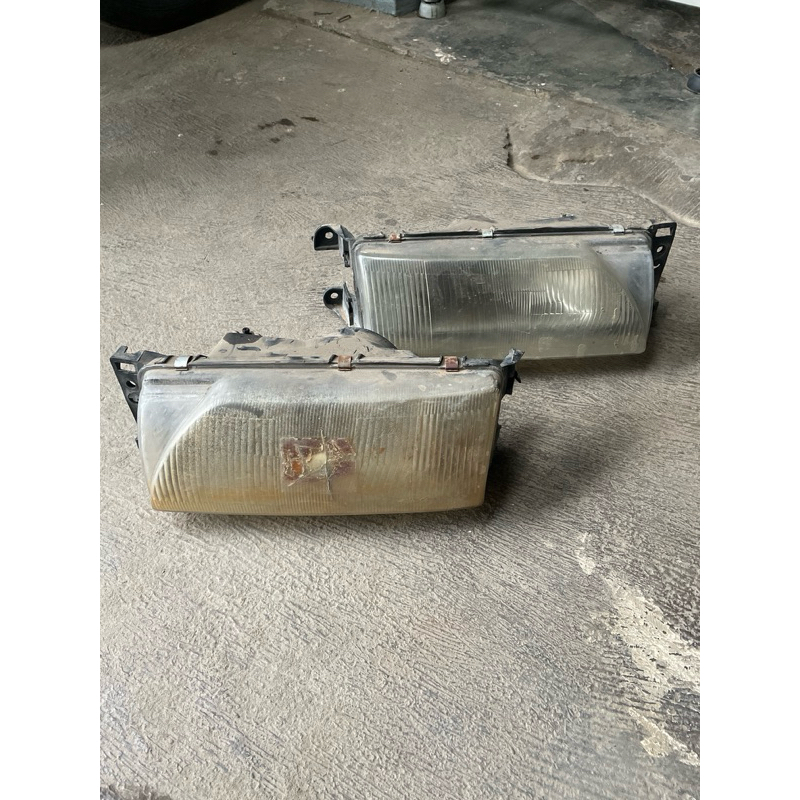 headlamp Ford laser gala