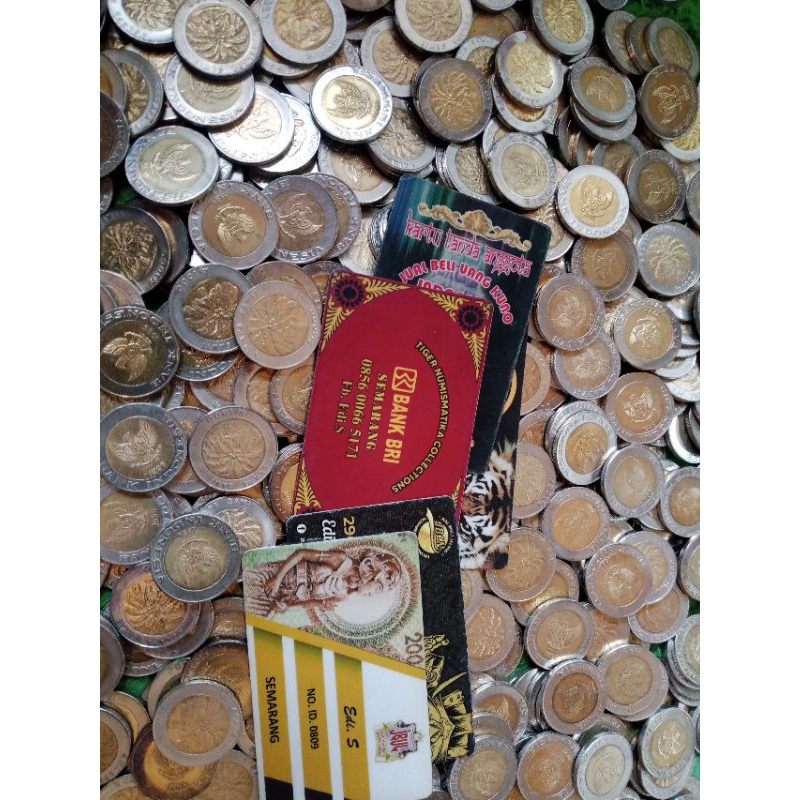 uang koin 1000 rupiah kelapa sawit