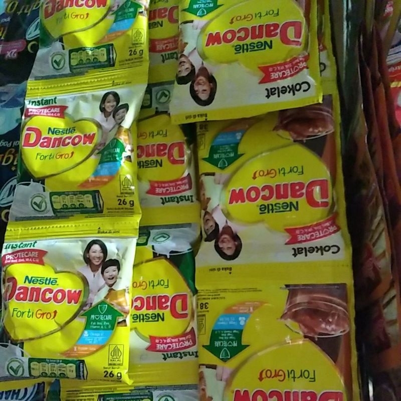 

dancow susu sachet bubuk instan dan coklat per renteng isi 10 sachet