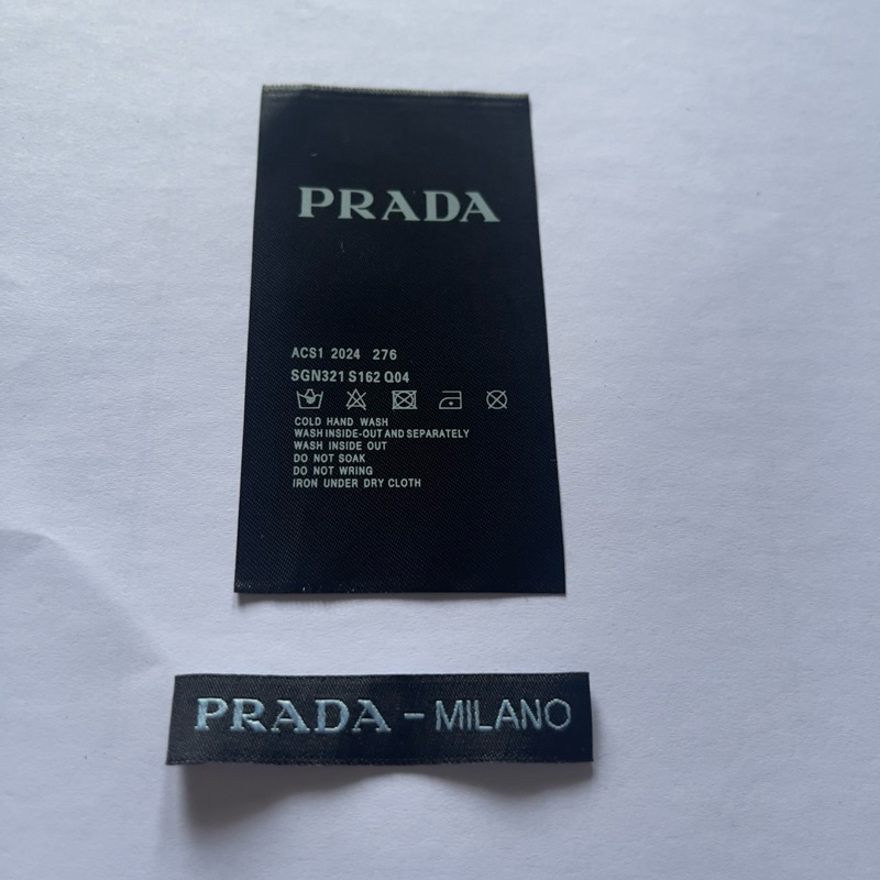 

alba_label tag prada