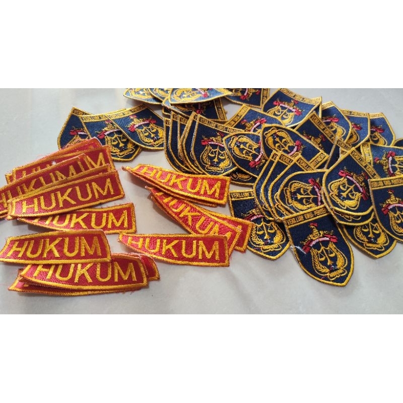 Lambang HUKUM UNHAS