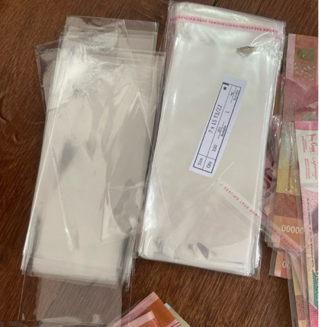 

plastik uang. tidak ada perekat & ada perekat