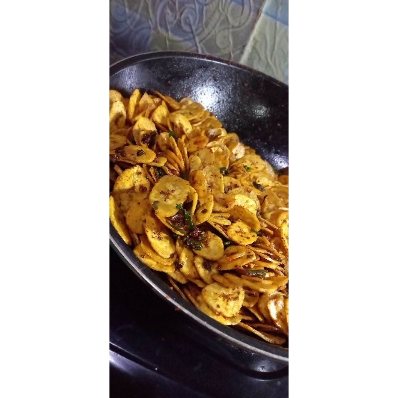 

PROMO Keripik pisang rasa pedas daun jeruk, berat 500gram