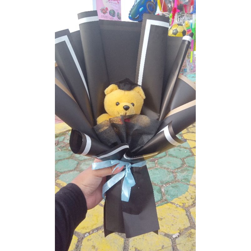 

bouqet single doll graduation