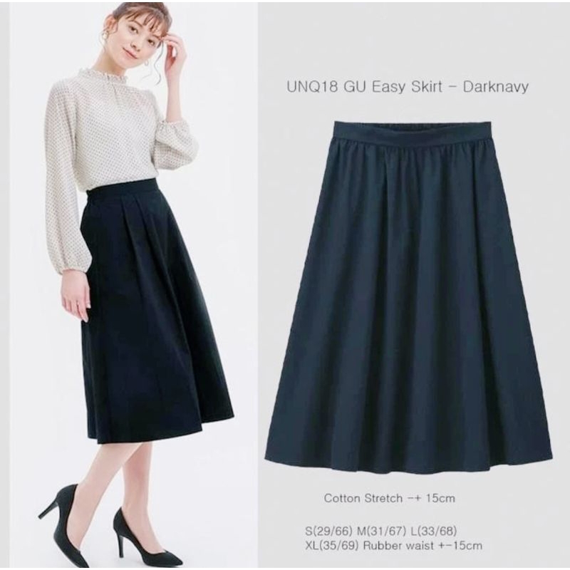 GU MIDI FLARE SKIRT IN DARK NAVY
